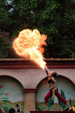Casey Martin blows a fireball